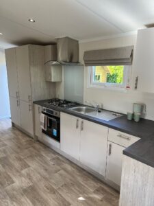 Nieuw chalet compleet aangelegd en ingericht met onderhoudsarme tuin op rustig 50+ park in Voorthuizen17